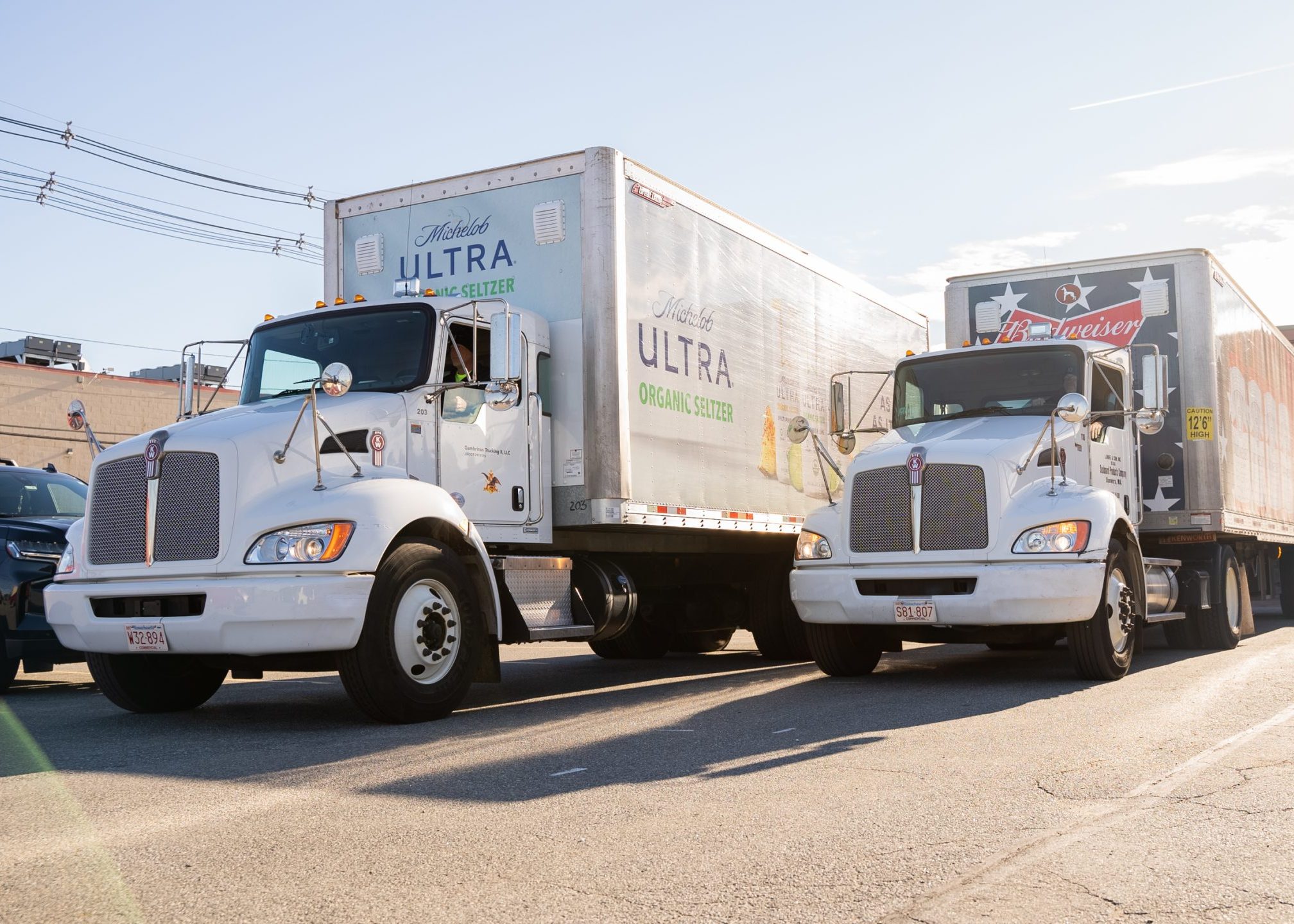 two SFC delivery trucks